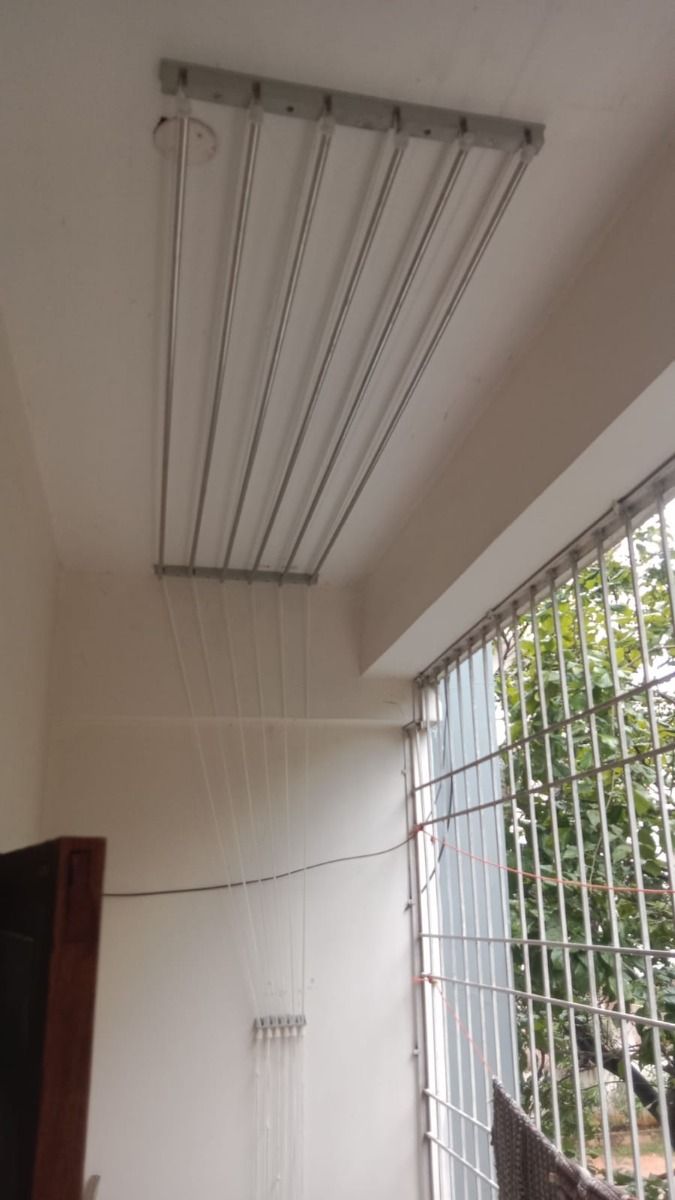 Gaara Ceiling Clothes Hangers installed in a balcony or utility area in Hebbal, Bengaluru