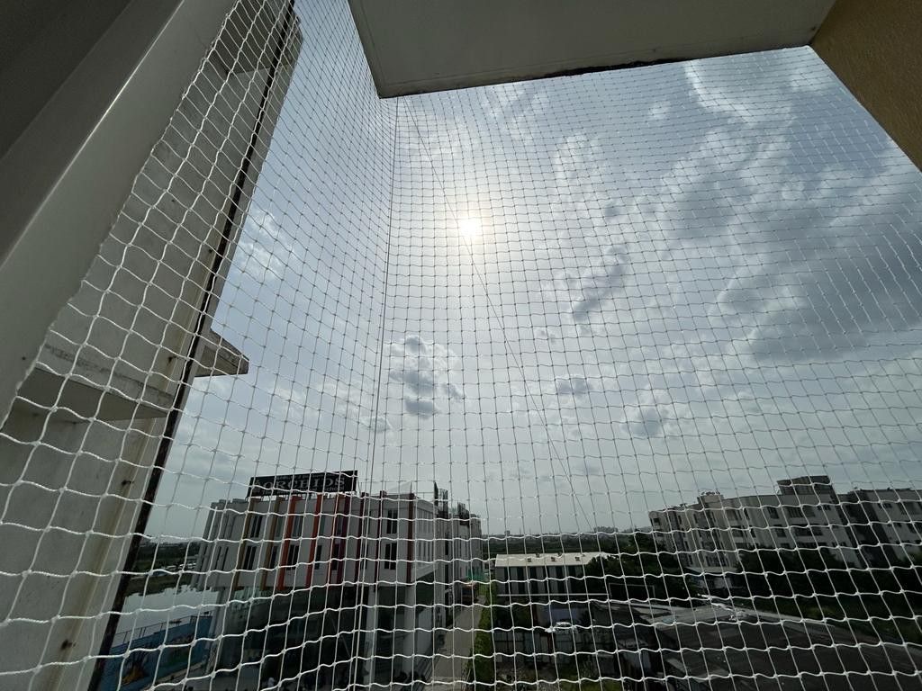 Pigeon protection net across an apartment balcony