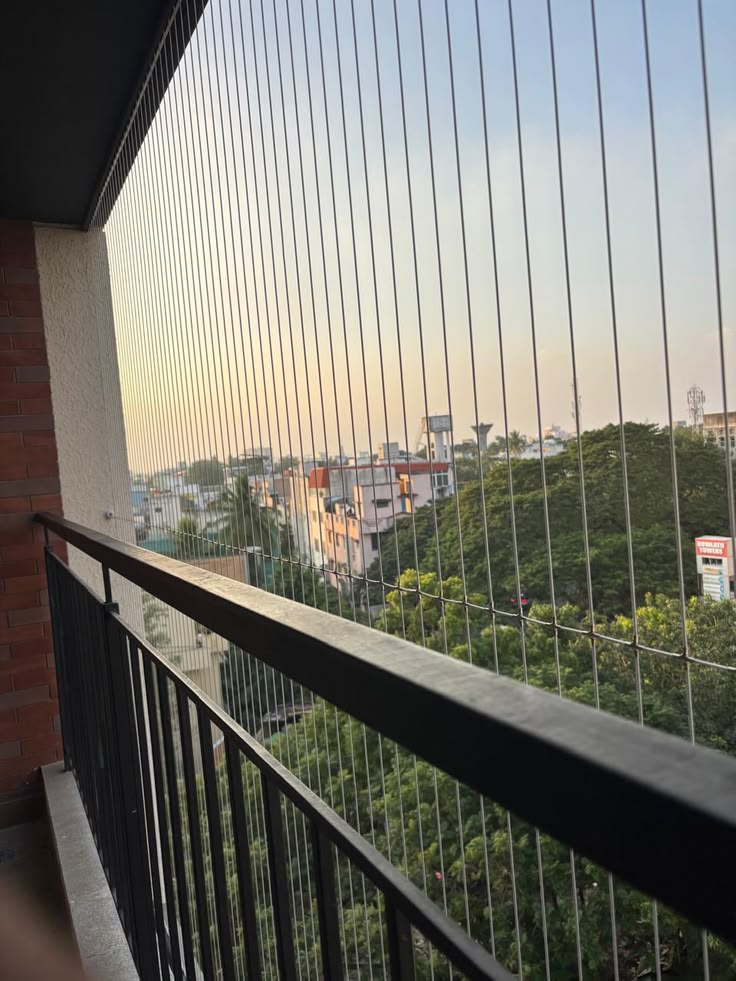 Invisible grill system for a modern balcony in Kadugodi, Bengaluru by Gaara Invisible Grills